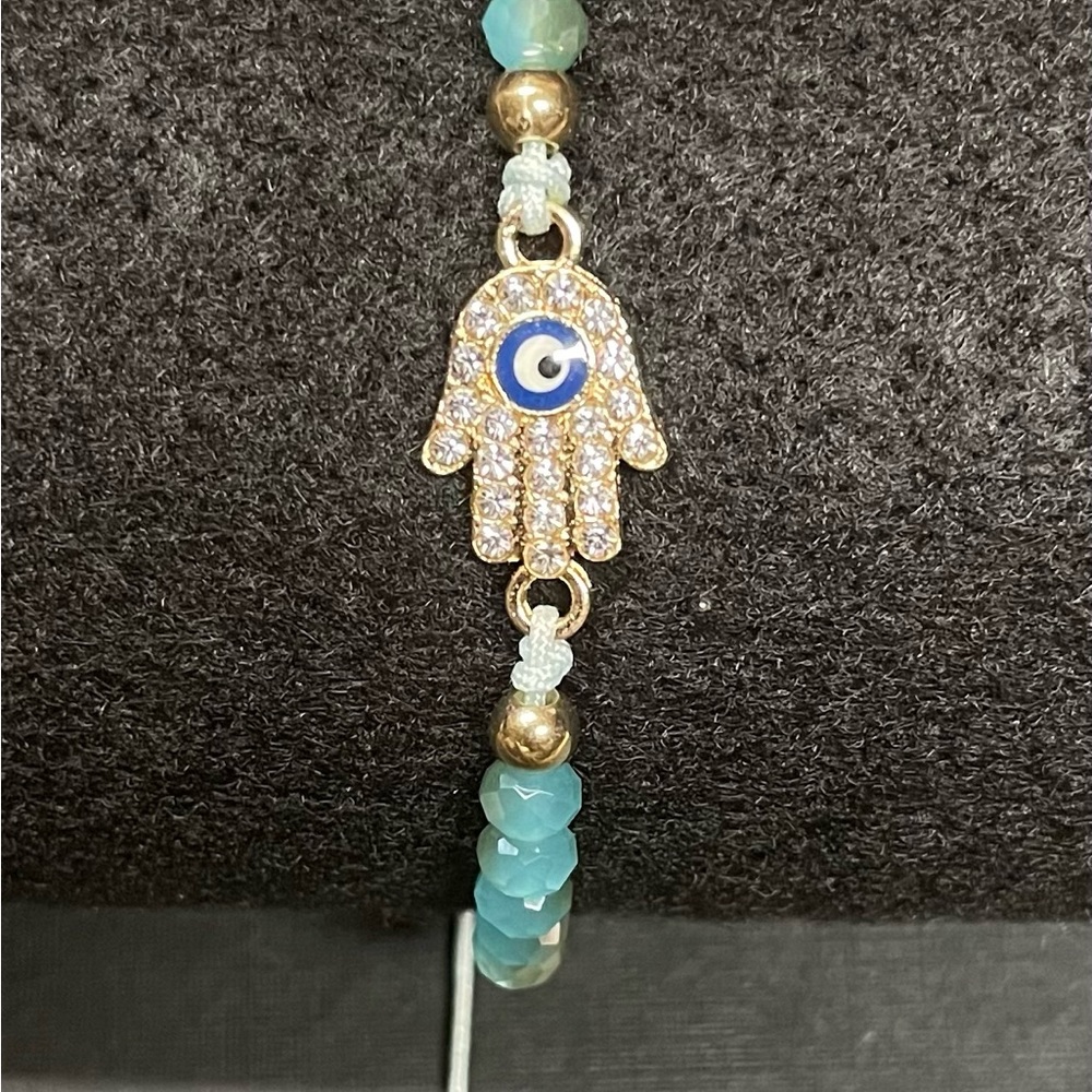 Hamsa hand charm - symbol of good luck
Greenish\Bluish and gold Beads NEW